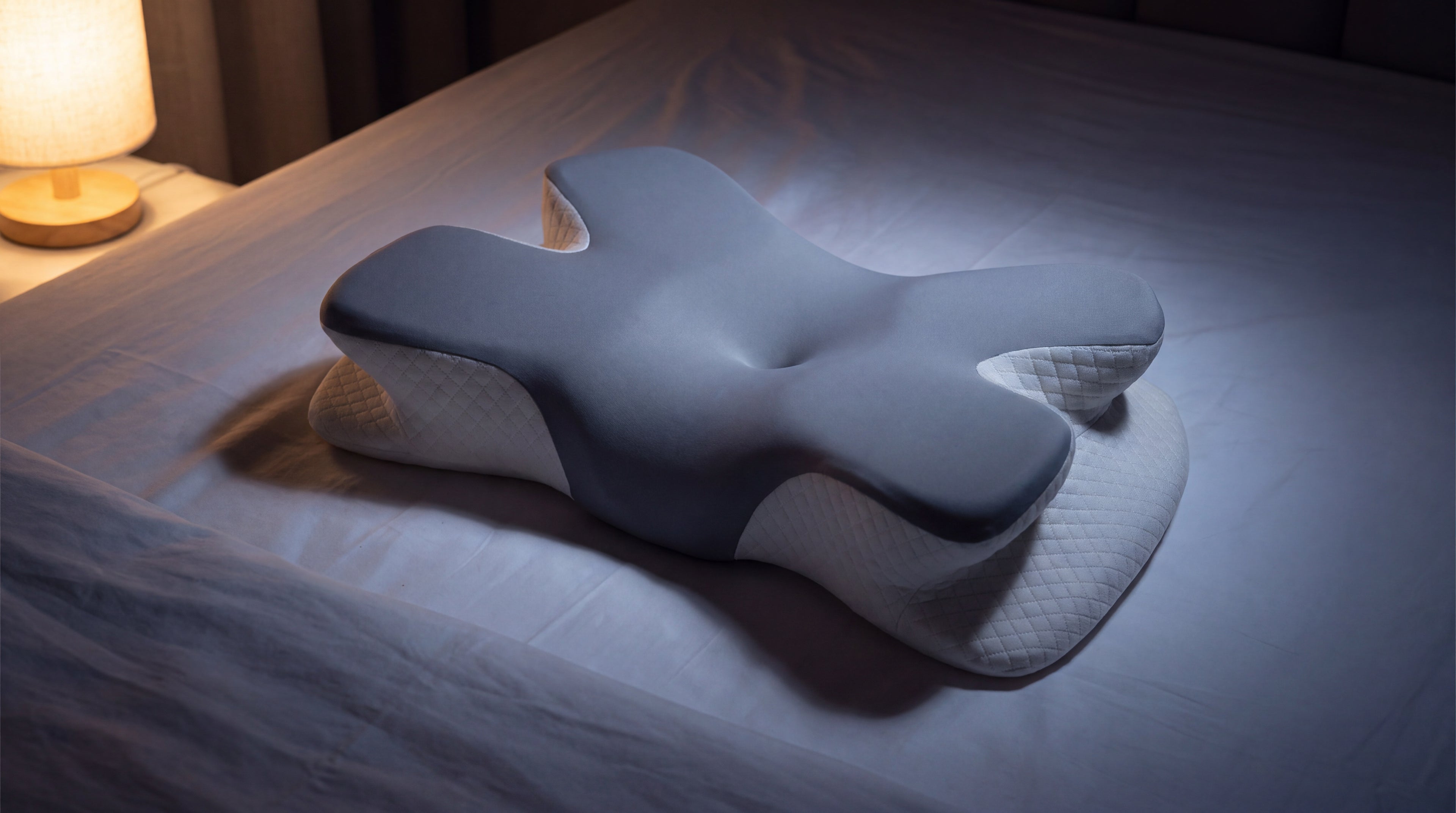 CervaHold night correction pillow on white bedding at night