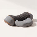 Tensorra Thermalign click-free neck device — charcoal honeycomb saddle with grey wings and tan trim